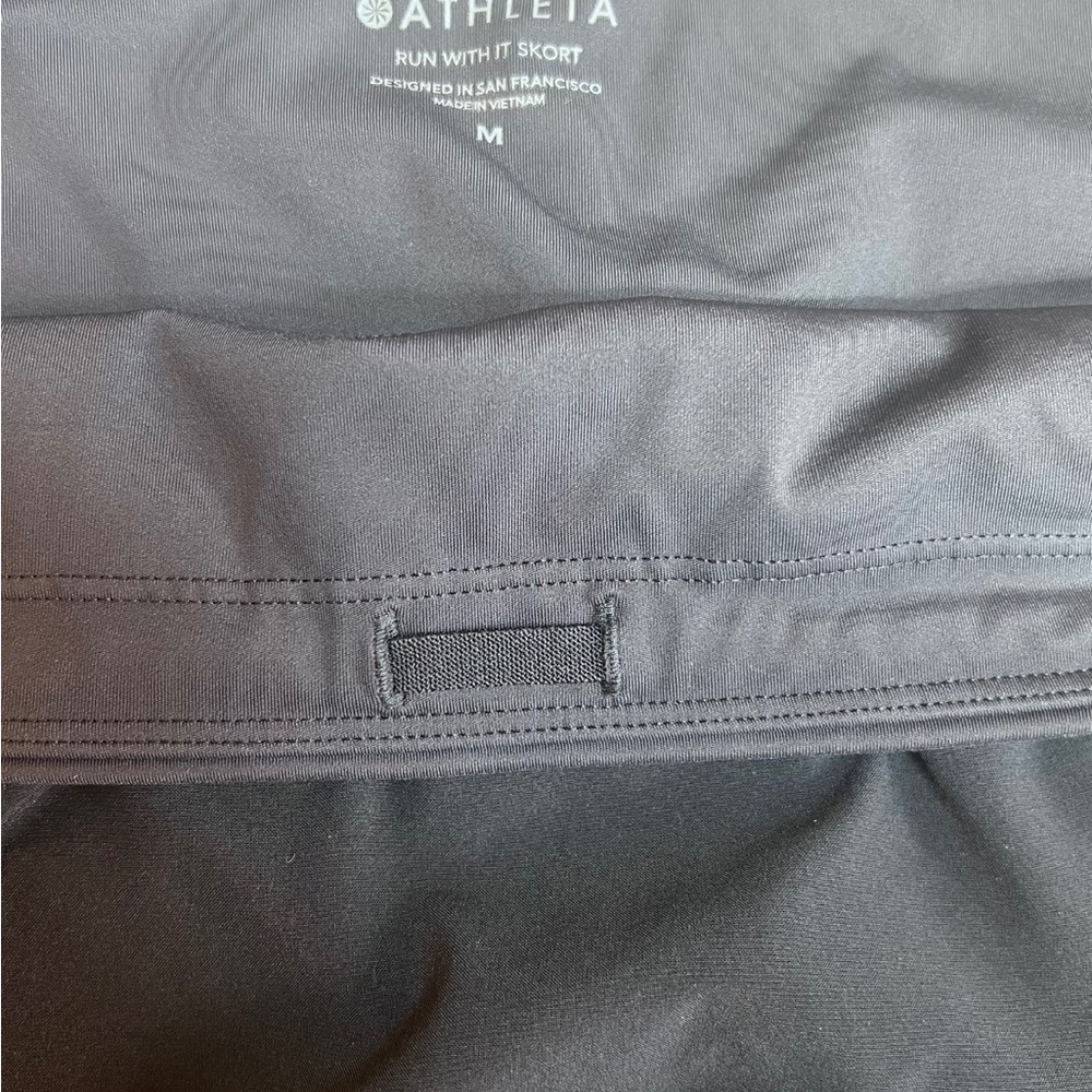 Athleta- black run with it skort- size medium